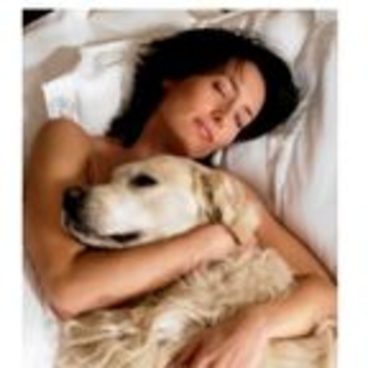 women sleeping with dogs
