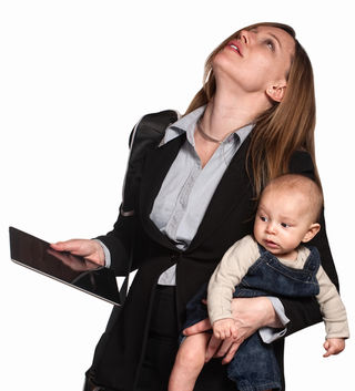 CREATISTA/Shutterstock, "Stressed out professional woman with baby over white background," used with permission.