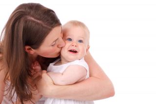 Mother Kissing Baby Mother Kissing Baby