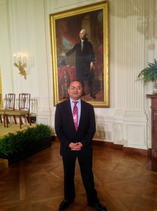 Dr. Dinesh Sharma in the East Room at the WH