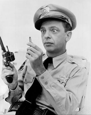 Barney Fife and his gun.