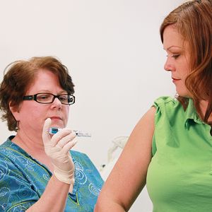 woman getting flu shot