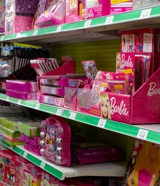 Image of pink Barbie products at a toystore