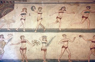 “’Bikini girls’ mosaic at Villa del Casale in Piazza Armerina, Sicily”/Kenton Greening/Wikimedia Commons