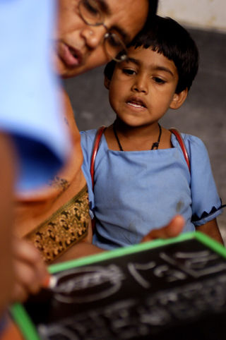 By Pratham Books from India (Children Reading Pratham Books and Akshara), CC BY 2.0, via Wikimedia Commons By Pratham Books from India (Children Reading Pratham Books and Akshara), CC BY 2.0, via Wikimedia Commons
