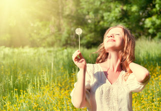 Purchased from Deposit photos, Copyright evgenyatam, "Beautiful girl enjoying the sun"