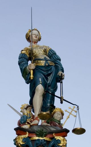 Lady Justice by Hans Gieng/Wikimedia Commons (http://bit.ly/1xXGHvH)