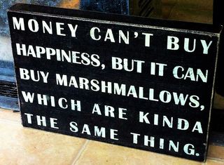 Money can't buy happiness by Tom Henrich Flickr Licensed Under CC BY 2.0