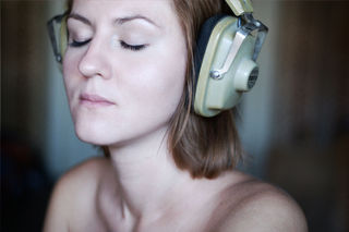 "Woman Listening through Headphones" by Kashirin Nickolai / Wikimedia Commons / CC BY 2.0 "Woman Listening through Headphones" by Kashirin Nickolai / Wikimedia Commons / CC BY 2.0