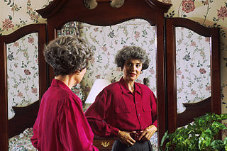 "Woman Looking in a Mirror," by Bill Branson, Wikimedia.org "Woman Looking in a Mirror," by Bill Branson, Wikimedia.org