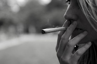woman smoking marijuana ashton/flickr.com