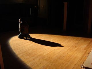 actor alone on stage