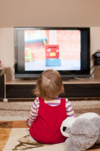 girl watching television