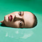 Image: Woman drowning in green liquid