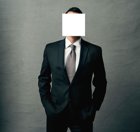 Businessman face hidden
