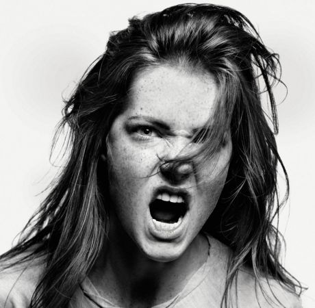 Girl making angry face