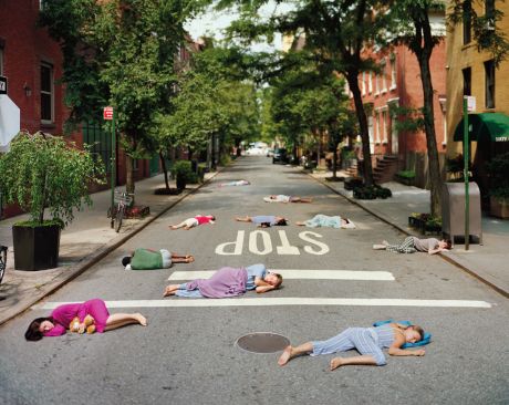 People sleeping on the street in pajamas
