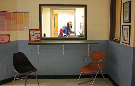 The Janitor
Val Barnes is halfway through her graveyard shift at a high school in upstate New York. She opted for night work to spend more time with her kids, and often skips sleep during the day to attend events with them. A female janitor cleaning a school at night