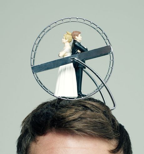  Man's head with bride-groom cake topper in a hamster wheel on top