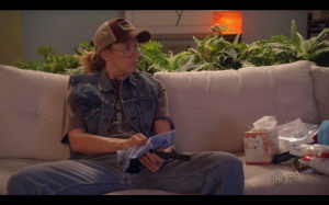 Buck, one of Tara's alters, shows how manly he is by cleaning his gun