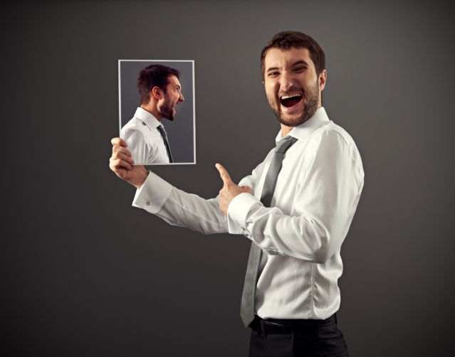 Person laughing at his own image