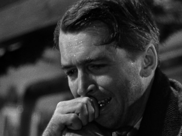 Jimmy Stewart in 'It's a Wonderful Life' (c. Liberty Films II, 1946) close-up Jimmy Stewart as George Bailey in 'It's a Wonderful Life', desperate