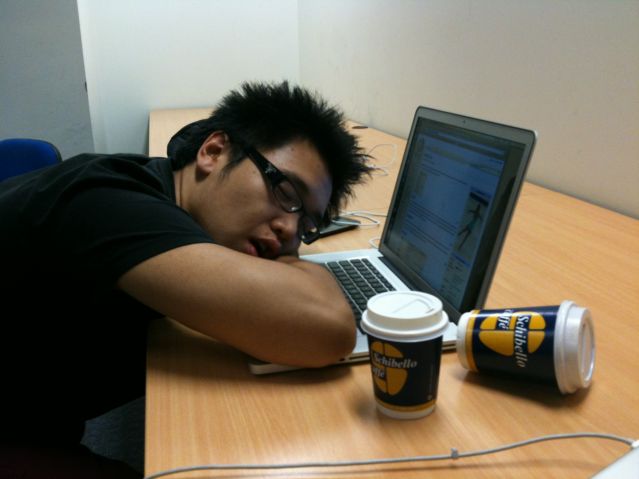 Tired During the Day? Young Man--Asleep at his Laptop