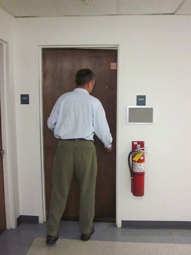 Keith opens his office door