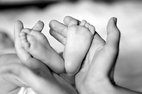 photo courtesy of Olga (Nezemnaya) baby feet in mother's hands