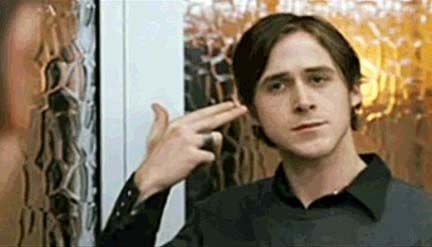 Gosling's character informs McGregor's that he's going to kill himself. Gosling's character holds two gun-like fingers to his temple.
