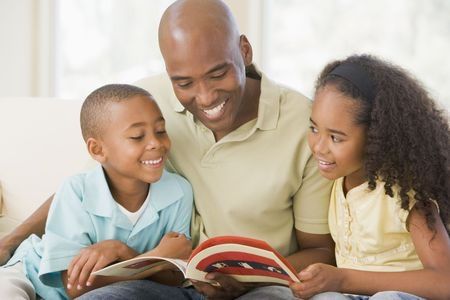 Father reading to children