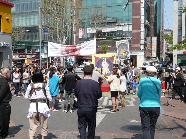 Religious people, some of whom are in jeans. Religious people in Korea