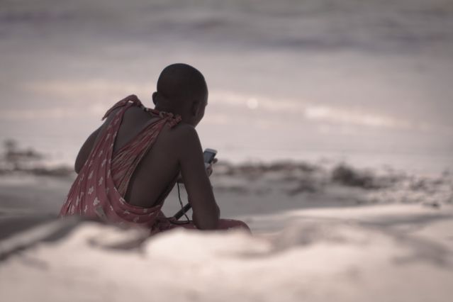 Masai With Phone by Simone D. Flickr Licensed under CC BY 2.0 Masai With Phone by Simone D. Flickr Licensed under CC BY 2.0