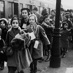 Children fleeing Nazi Germany. Neck tags identified who they were, where they came from, where they were going